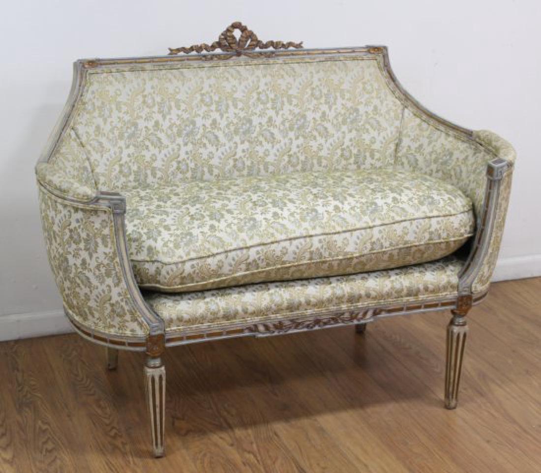 French Style Carved Walnut Loveseat: With curved arms. Approx. 38 3/4" H x 50" W x 20" D.