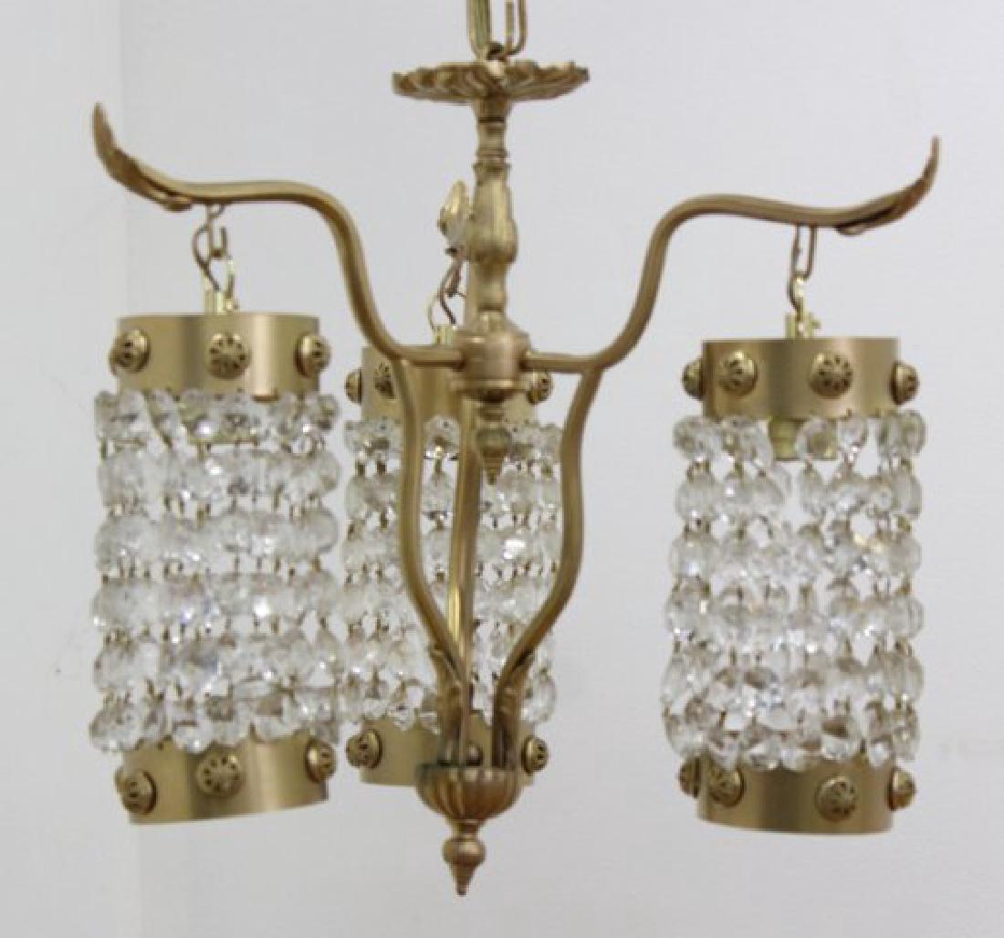 3-Light Gilt Metal Beaded Chandelier: Mid-century style. Approx. 16" x 15". From the liquidation of Barnette Shure Antiques in Valley Stream, NY.
