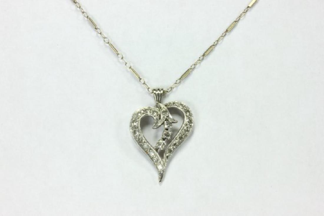 White Gold Necklace w/ Diamond Studded Drop: Heart-shaped drop. Approx. 3.5 dwt.