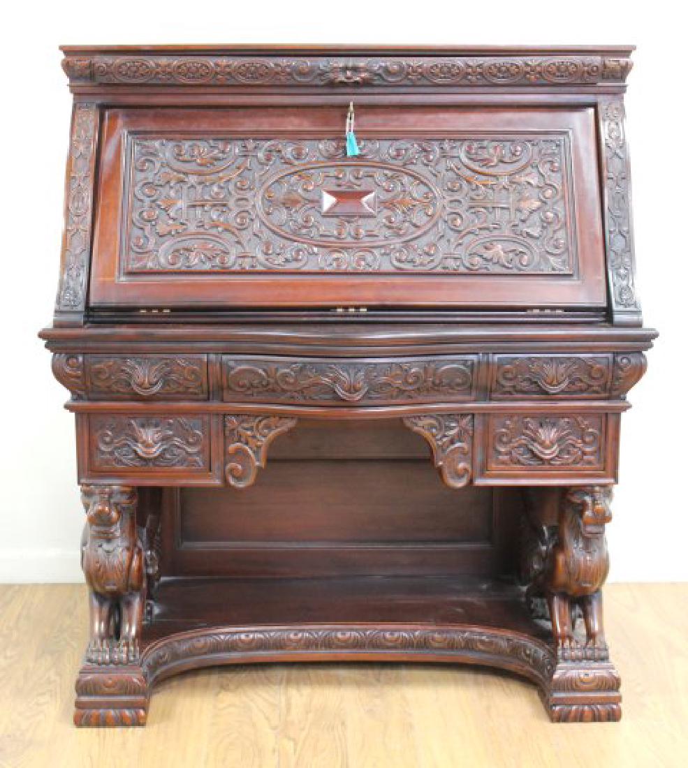 Horner Style Mahogany Griffon Desk: Approx. 48" H x 41 1/2" W x 22 1/2" D.