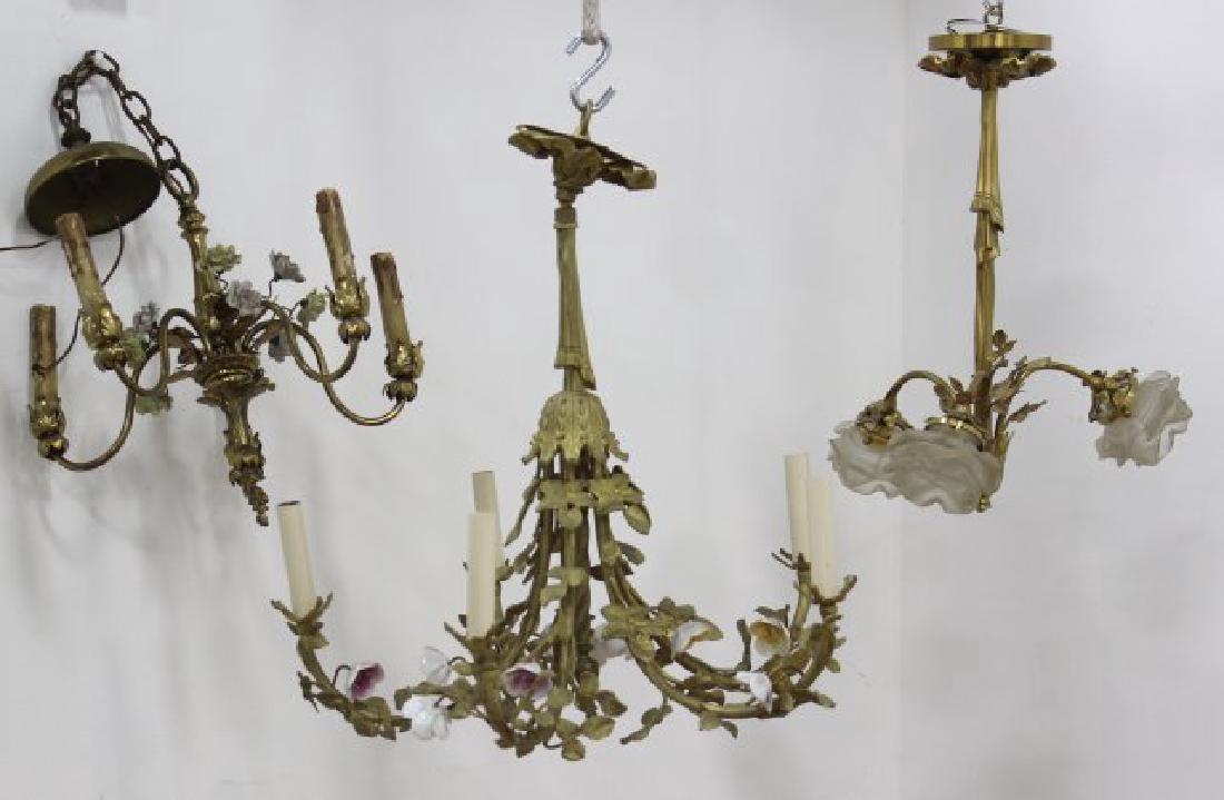3 Louis XV Style Gilt Metal, Porcelain Chandeliers: 2 with porcelain flowers. 1-3 arm, 2-5 arm. Largest approx. 22" H x 21" diameter. (XX62, 042992B, 022397D)