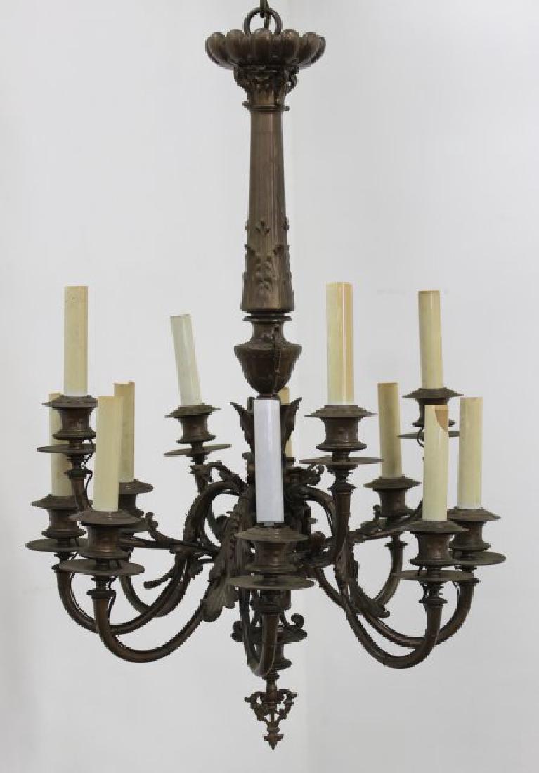 Neoclassic Style Bronze 12-Light Chandelier: Approx. 29" H x 19 1/2" diameter. (SF1917)