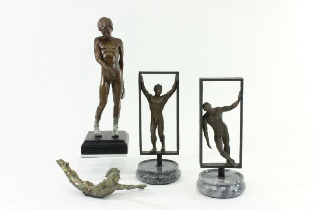 4 Male Nude Figures: Including erotic male nude signed Wim, numbered 10/50, and dated 1993; pair male nude figures in doorjams; and male nude acrobat. Tallest approx. 14 1/2" H. From a N.Y.C. collector. From the Adonis Co