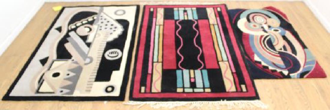 3 Sculpted Abstract Rugs: Style of Sonia Delaunay. Approx. 41" x 66", 41 1/2" x 65", and 26 1/4" x 48". From a New Rochelle estate of a French art dealer. (6221)