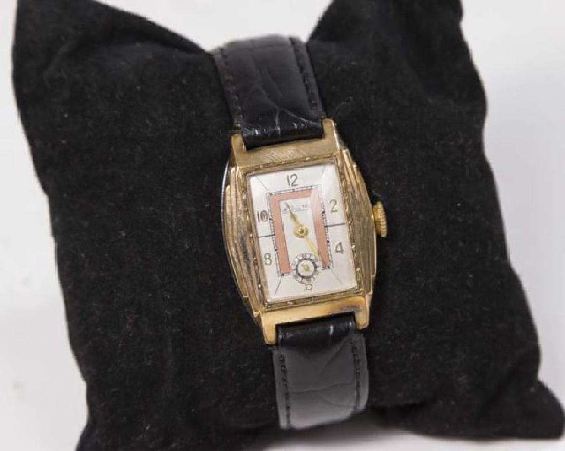 1940s LeCoultre Men's Wrist Watch: 21 jewels. 3 adjusts. 16mm leather band. (6152)