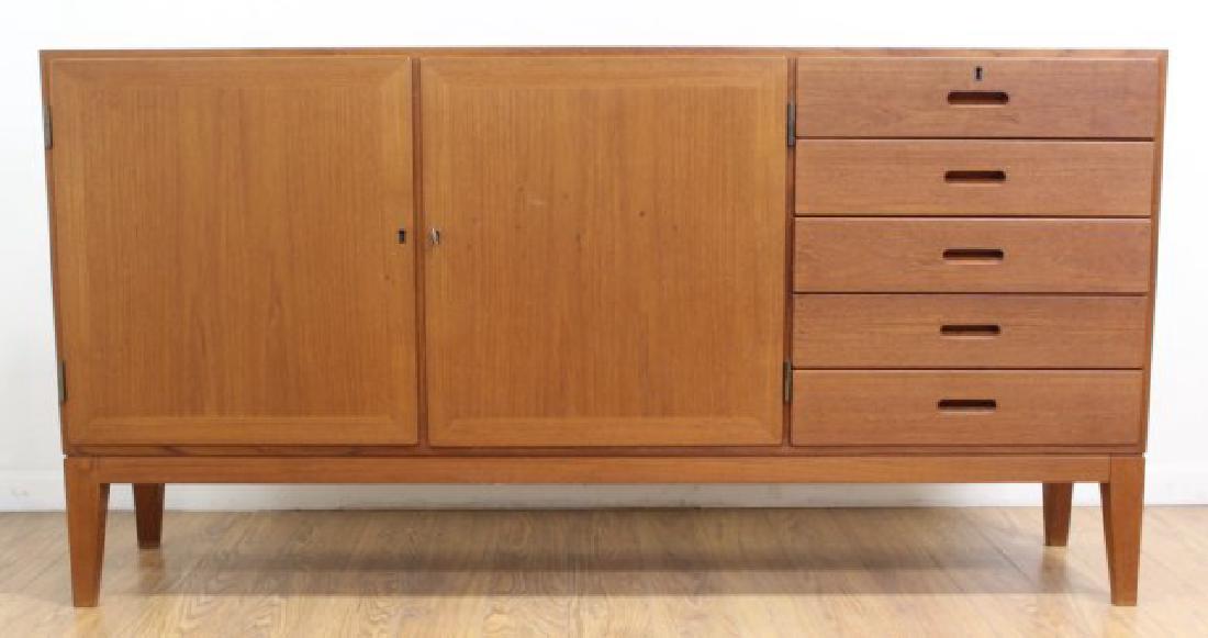 Danish Modern Teak Sideboard: Circa 1960. Approx. 33 1/4" H x 64 1/2" W x 16" D. (6208) Scratches.