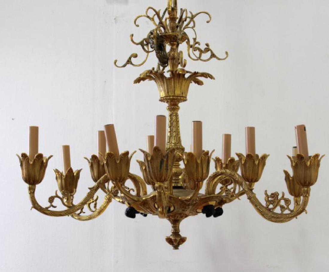 Rococo Style Foliate Cast 12-Light Chandelier: Approx. 25" H x 29" diameter.