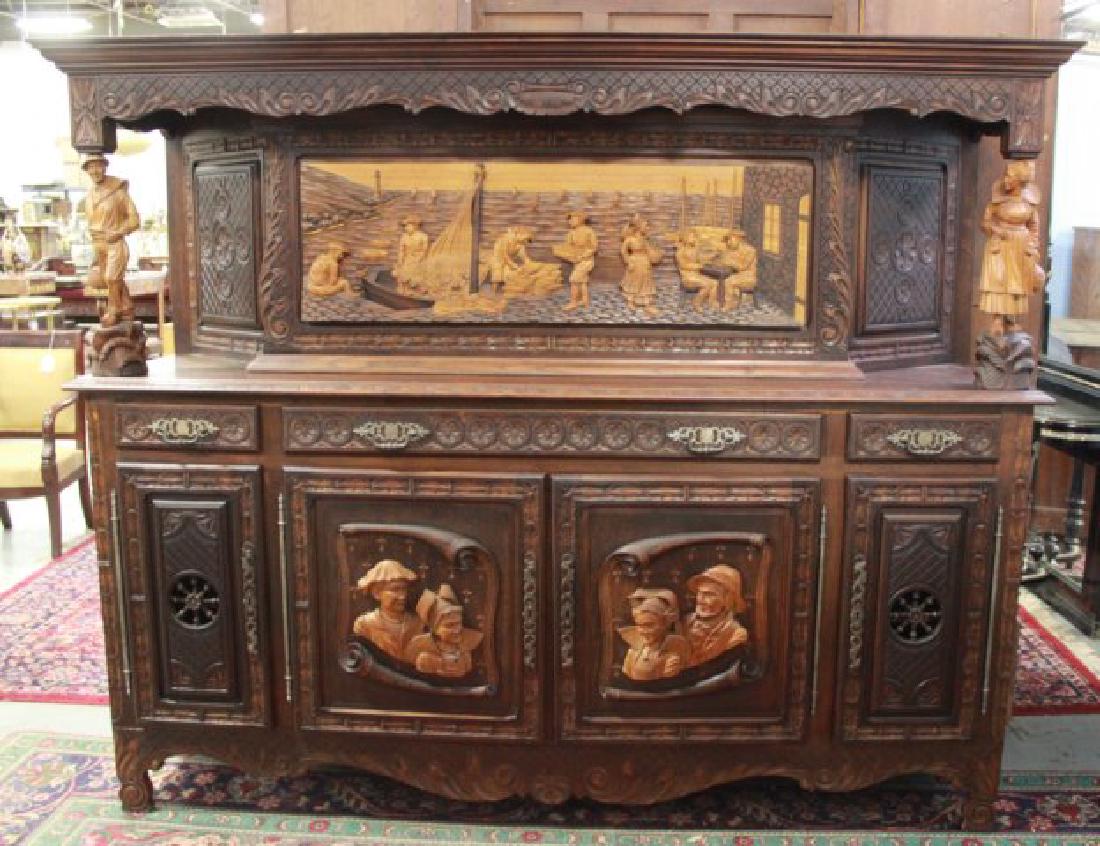 Heavily Carved Oak Court Cupboard: Decorated with fisherman on sliding door. Male and female figures on each side. Carvings of couple on each door. Approx. 70" H x 85" W x 25 1/4" D.