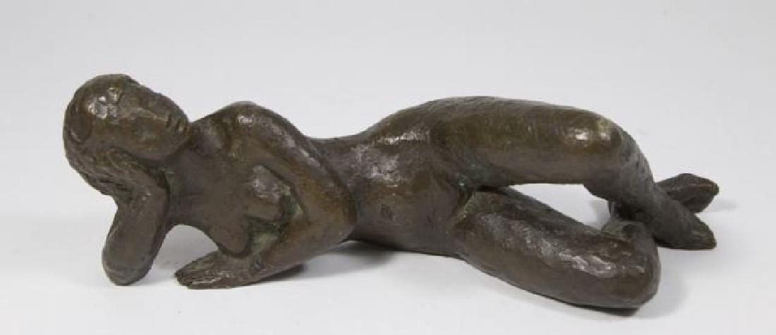 :Bronze Sculpture of Reclining Nude Woman: Artist signed Talbin on foot. Approx. 3 1/2" x 11".