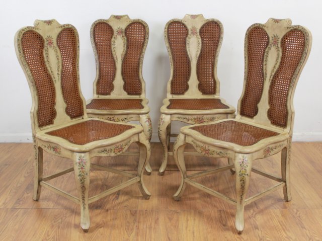 4 Venetian Paint Decorated Chairs: Cane back. Cane seat. Floral decorations. Approx. 42 1/2" x 20 1/2" x 20" D.