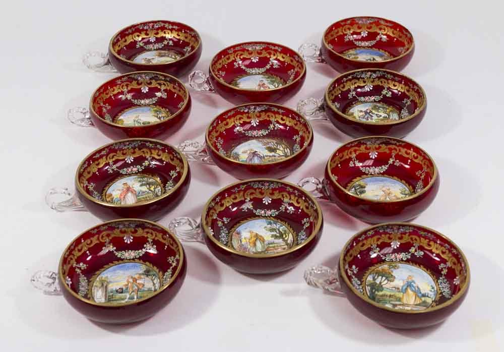 11 Venetian Glass Handpainted Cups: 4 with scenes with men, 7 with females. Approx. 1 1/2" H x 4 1/4" diameter. (6235) 2 cups with minor chips on rim.