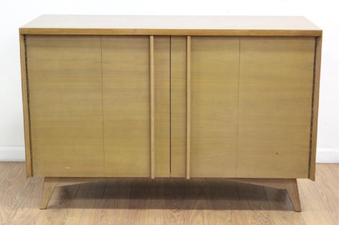 :Mid-Century Modern Faded Walnut Chest of Drawers: Circa 1950. Approx. 32" H x 48" W x 19" D. (6221)