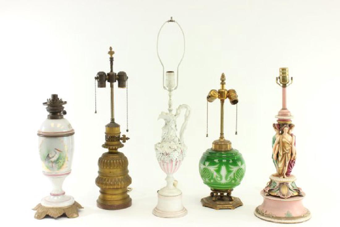5 Victorian Style Lamps: One brass, two glass, and two porcelain. Largest approx. 18" H. (111495H, 100195C, 112396B, 122296E)
