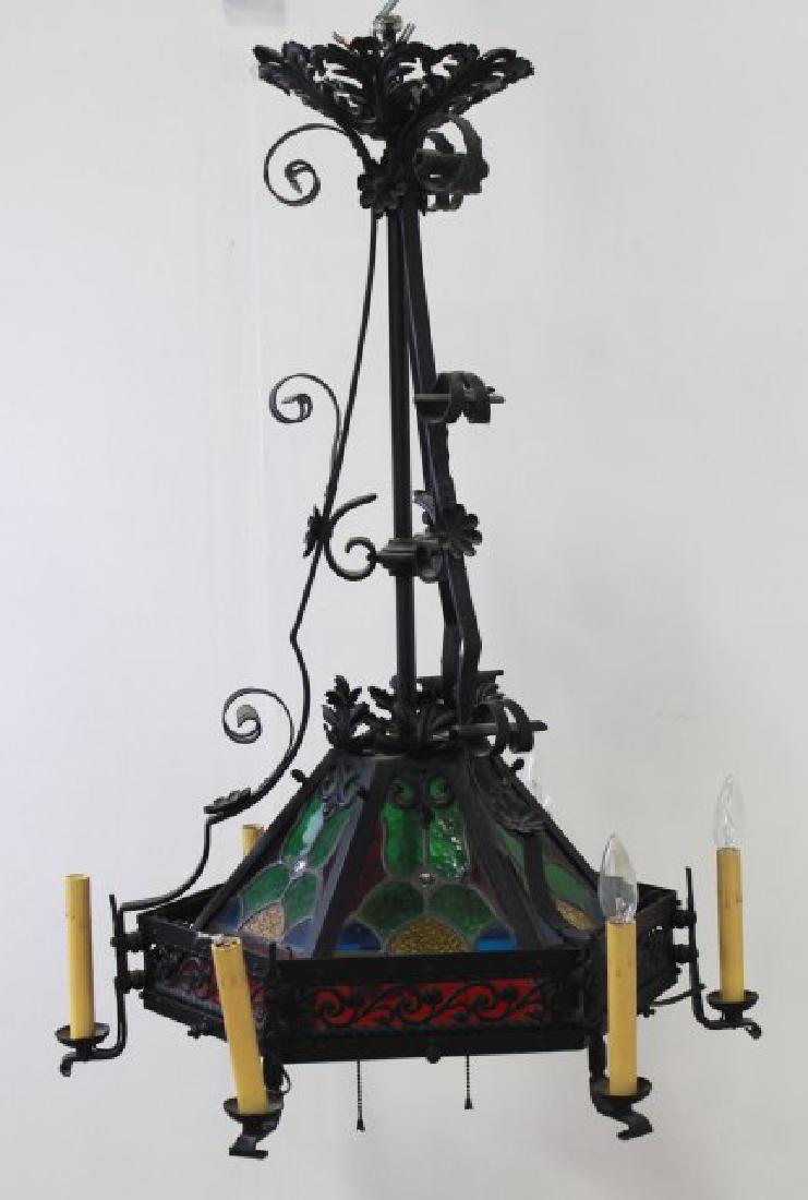 8-Light Stained Glass Wrought Iron Chandelier: Approx. 36" H x 27" D.