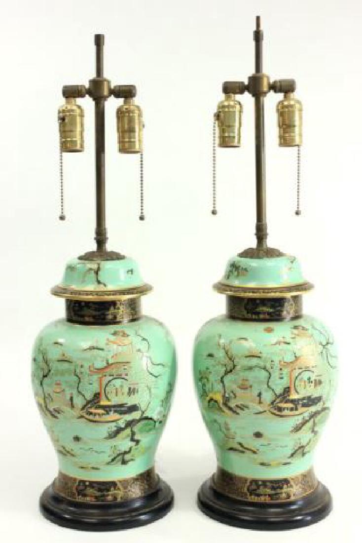 :Pair Chinese Motif Porcelain Covered Urns: Handpainted. Mounted as lamps. Possibly English. Vases approx. 12 1/2" H. One urn has crack on top.