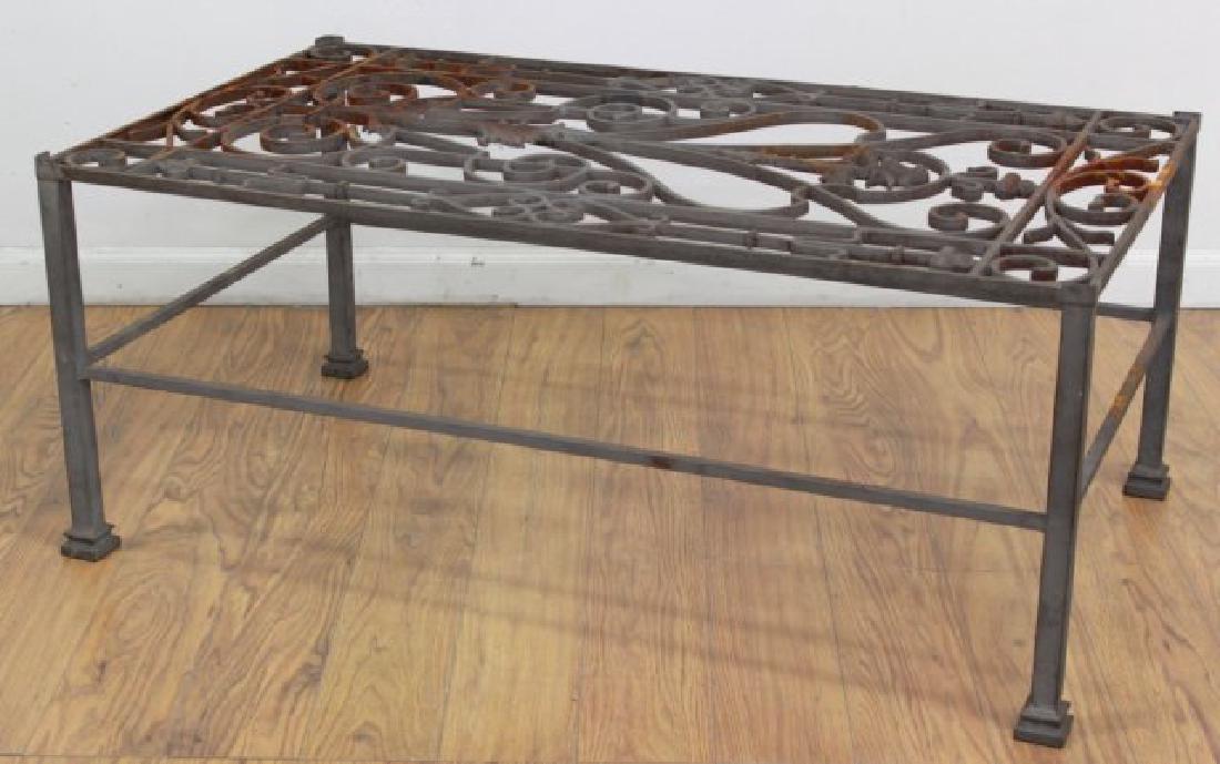 Iron Coffee Table: Approx. 17 1/2" x 42" W x 23 1/2" D. Missing glass top.