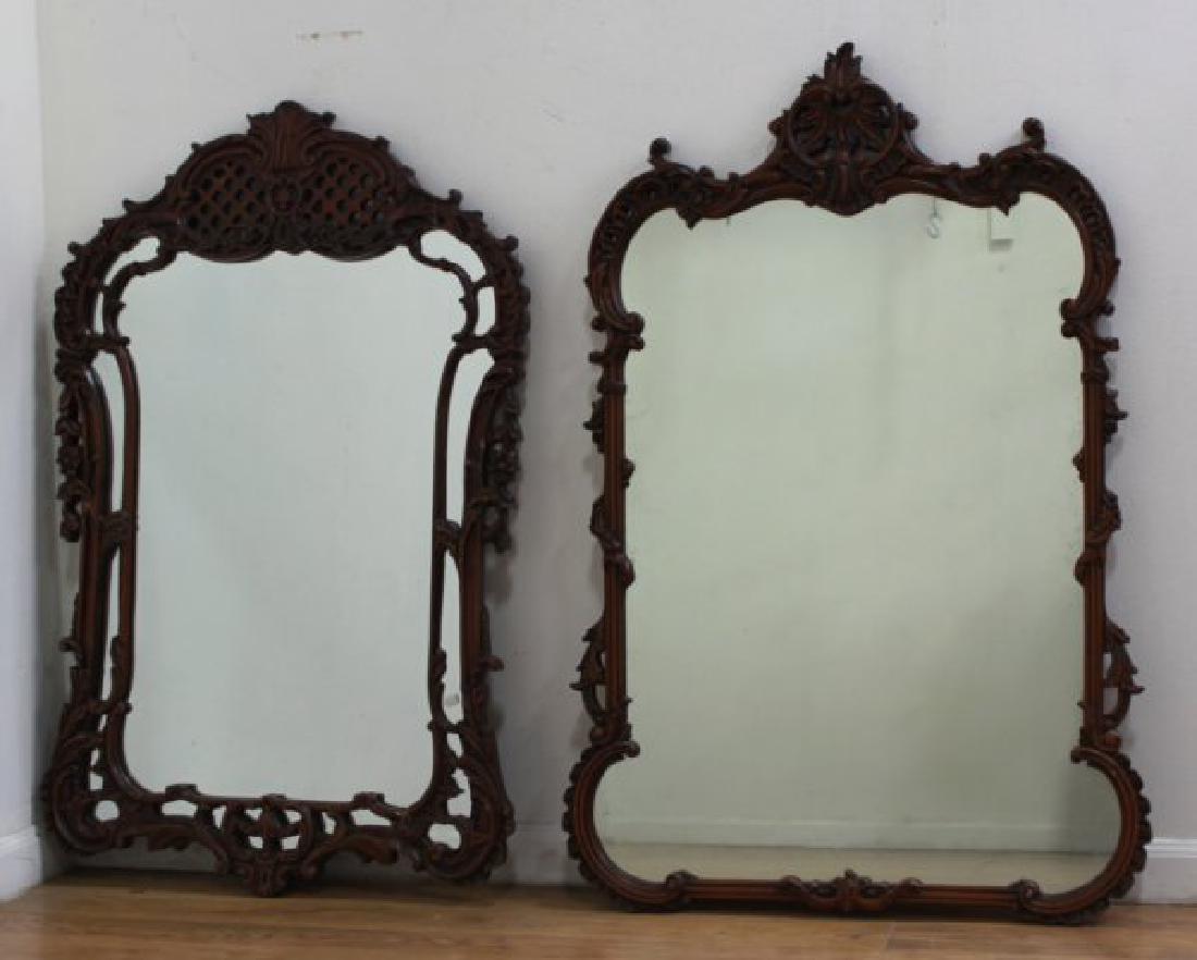2 Carved Mahogany Mirrors: Circa 1930s. Approx. 44" H x 27" W.