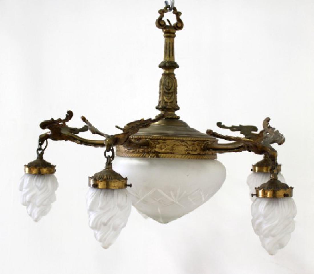 Neoclassic Style Gilt Metal 5-Light Chandelier: With central dome and spread wing eagle arm. Approx. 16" H x 24" diameter.