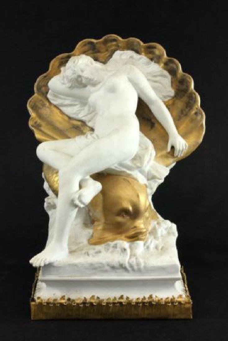 :Unglazed French Porcelain Sculpture: Goddess Amphitrite riding dolphin. Signed Oliveri Paris. Approx. 20" H x 15" x 11 1/2".
