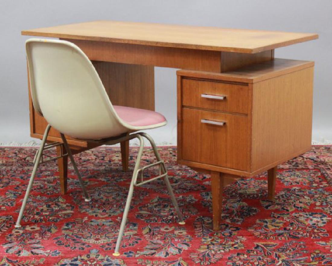Mid-Century Herman Miller Chair & Scandinavian Desk: Desk approx. 30" H x 48" W x 22" D. Desk needs refinishing. Chair legs are pitted.