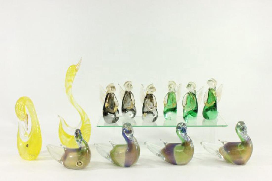Lot 12 Mid-Century Venetian Glass Figurines: Including 4 ducks, 2 yellow swans, and 6 angels. Tallest approx. 13 3/4".