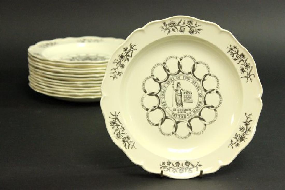 Set 13 Wedgwood Plates: With illustrations of state seals for the original 13 colonies. Approx. 9 3/4".