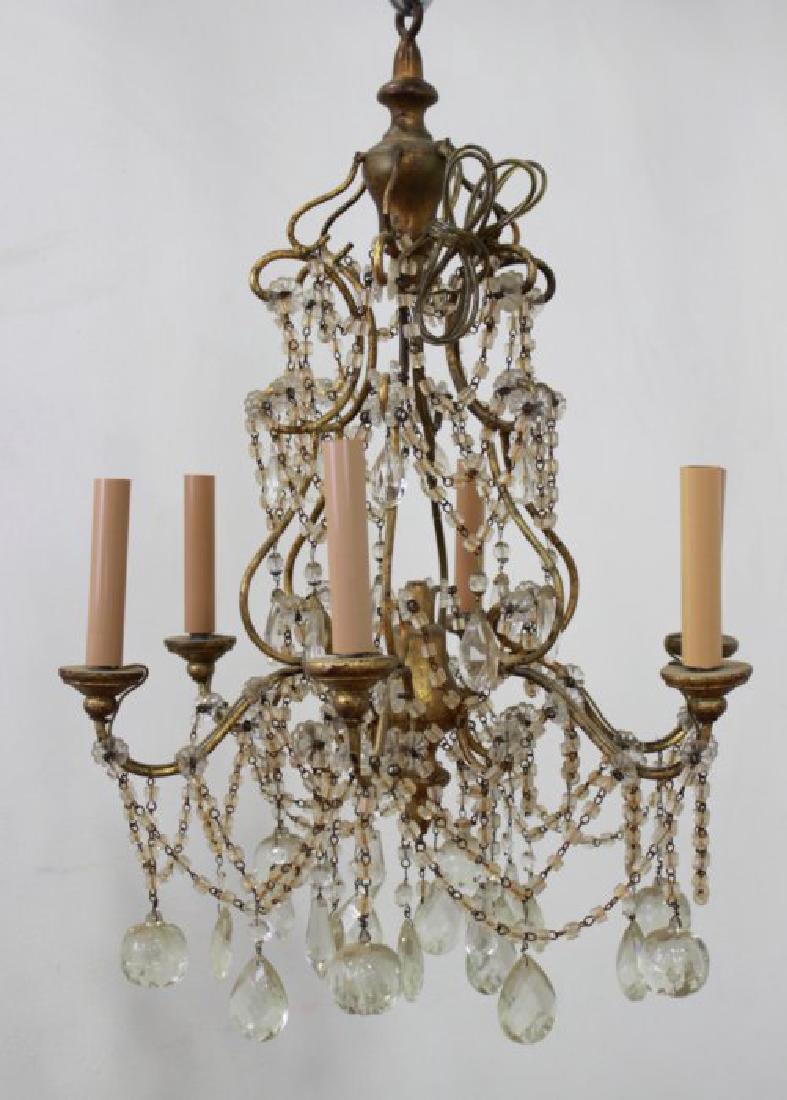 Italian Rococo Style Gilt Metal 6-Light Chandelier: Beaded glass. Approx. 24" H x 18 1/2" diameter.
