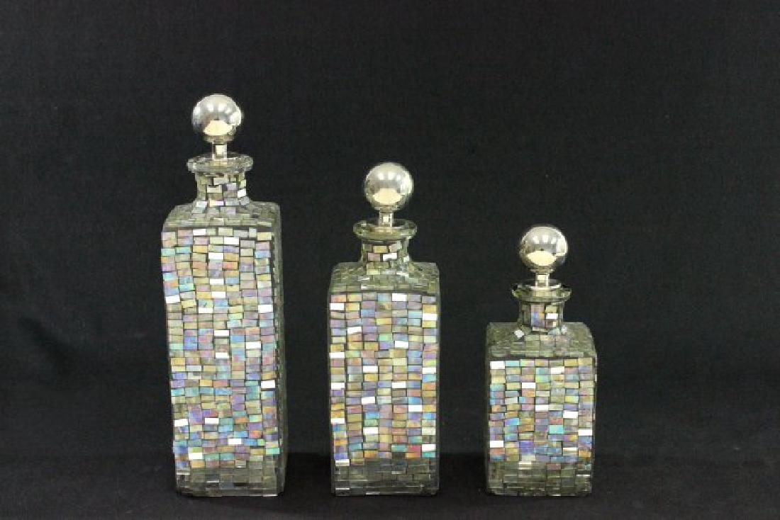 Set of 3 Modernism Glass Decanters: With metal stoppers. Tallest approx. 13" H.