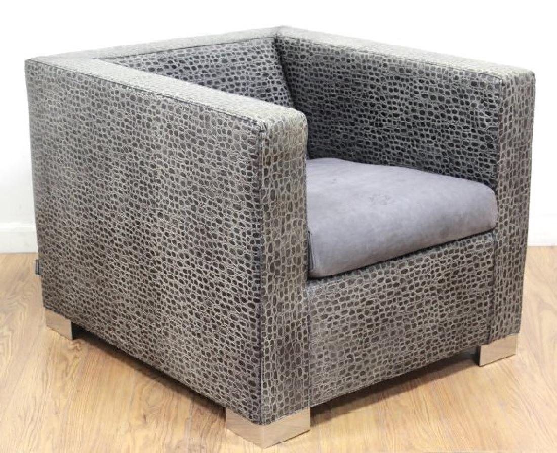 Minotti Leather Upholstered Club Chair: With chrome feet. Approx. 25 1/2" H x 29 1/2" W x 33 1/2" D.