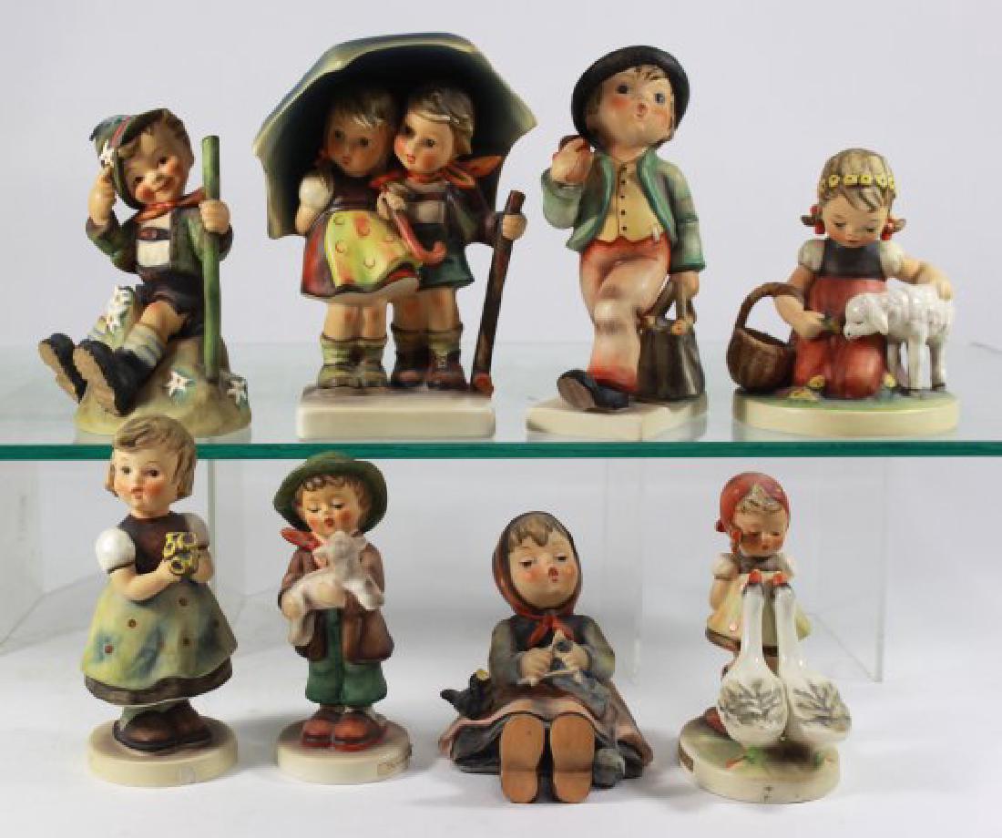 8 Piece Hummel Lot: Including Merry Wanderer, approx. 6" H; Mountaineer, Goose Girl, and other.