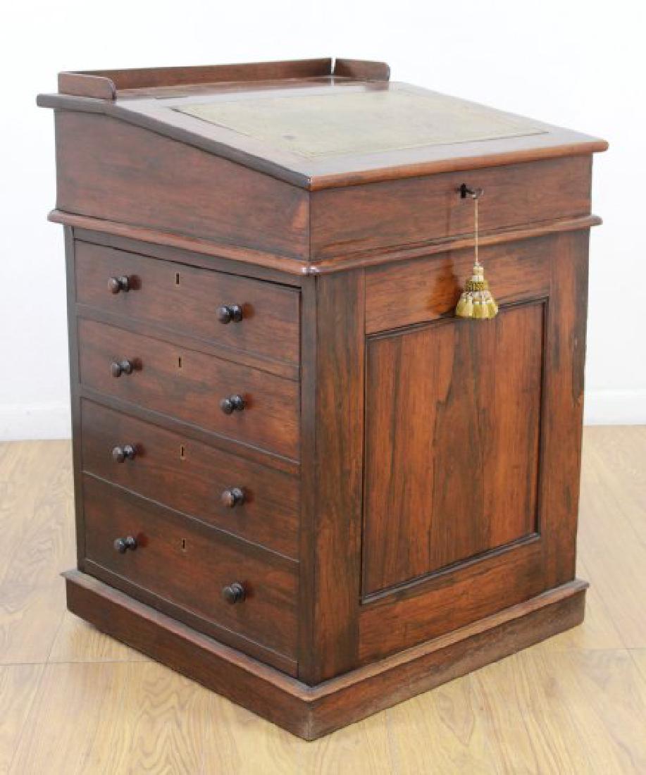 19th Century English Captain's Davenport Desk: Black walnut. Approx. 34 1/2" H x 23 1/2" W x 23 1/2" D. From the estate of Bent Ove Petersen.