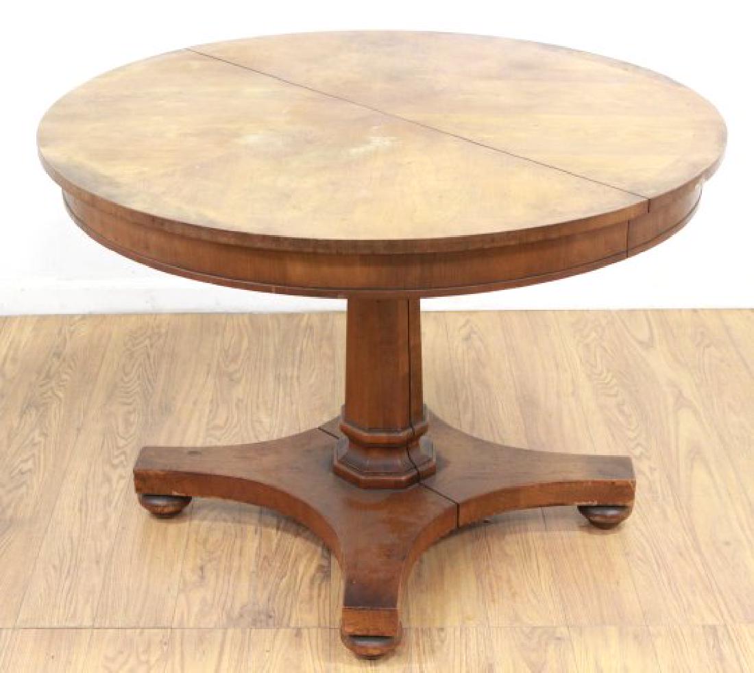 Round Pedestal Dining Room Table: Banded top. Approx. 29" H x 42" diameter. With 3-16" W leaves. From the estate of Bent Ove Petersen. Needs to be refinished.