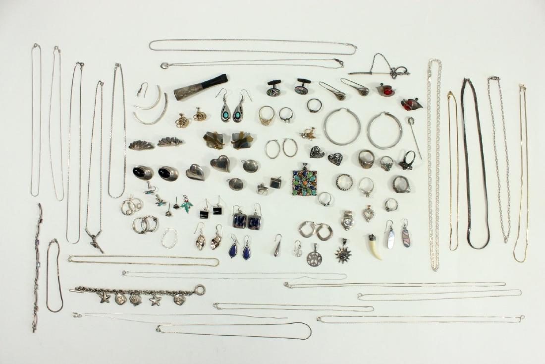 Lot of Sterling Silver Jewelry: Including chains, pendants, rings, and more. Approx. 13 ozt. (7045)