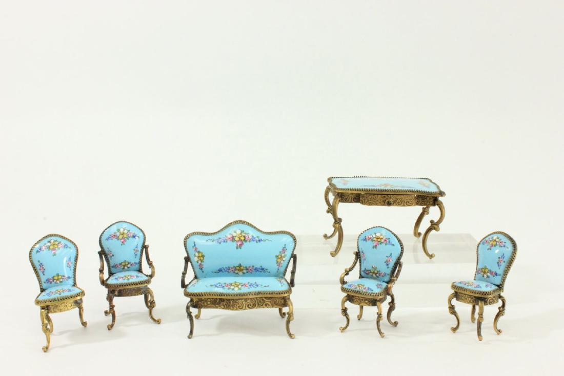 Diminutive Enamel Parlor Set: Including 4 chairs, loveseat, and center table. (6231) Enamel loss on table. 1 leg missing on chair.