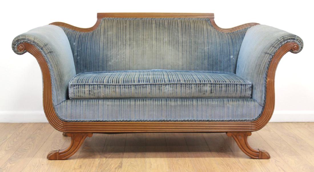Duncan Phyfe Style Blue Upholstered Loveseat: Circa 1930s-40s. Mahogany frame. Approx. 32" H x 66" x 29" D. Contents from a Union City, NJ estate. Upholstery needs cleaning.
