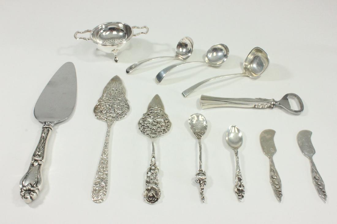 Lot of Silver Pieces: Including pie servers, butter pats, and more. Tea balls silverplate. Approx. 9.21 ozt. (7070)