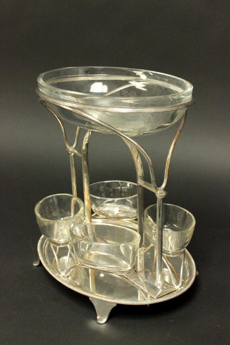 Silverplated Centerpiece with Glass Inserts: Unmarked. Approx. 12 1/2" H x 12" W.