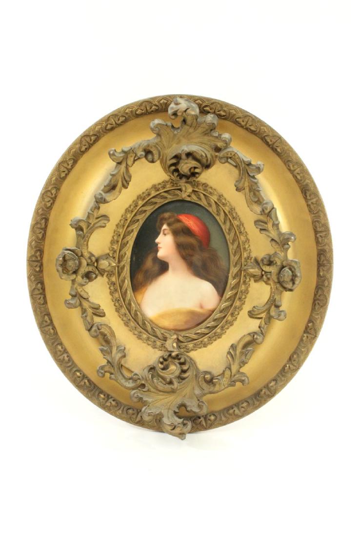 Hutschenreuther Hand Painted Portrait Plaque: "Una Gitana." Porcelain. Depicting woman. In gilded oval frame. Signed lower left, Wagner. 19th century. Approx. 5" x 4" plaque, 12" x 11" with frame. From a Plainfield, NJ mansion estate, featuring a