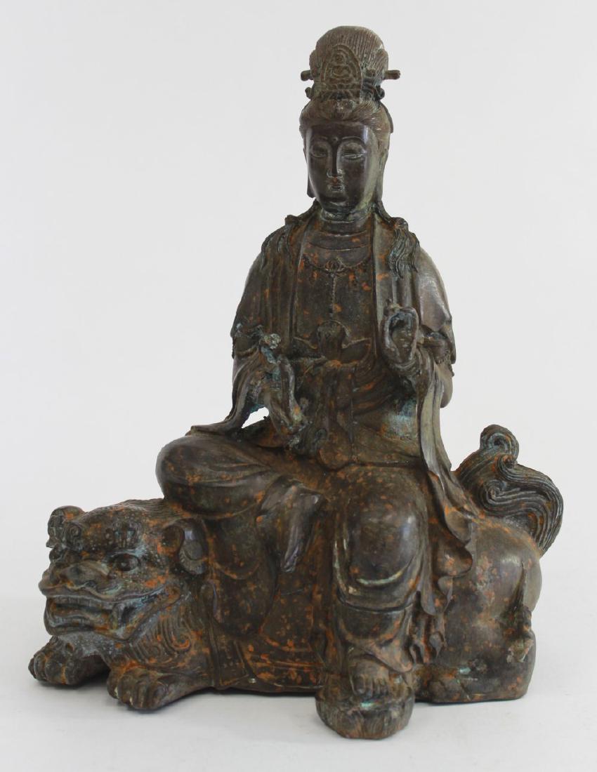 Bronze Guanyin Figure Seated on Foo Dog (1 of 6)