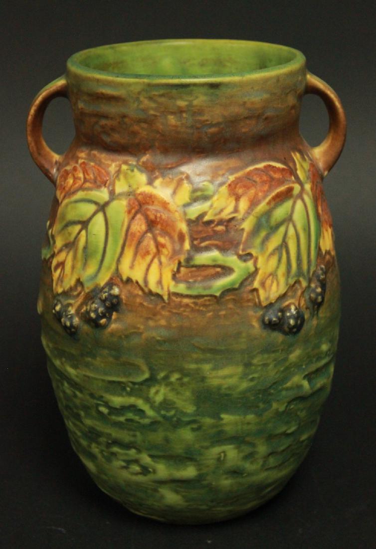 Roseville Blackberry Art Pottery Vase: 2 handles. Approx. 8 1/4" H. From the personal collection of Jeffrey Zimmerman.