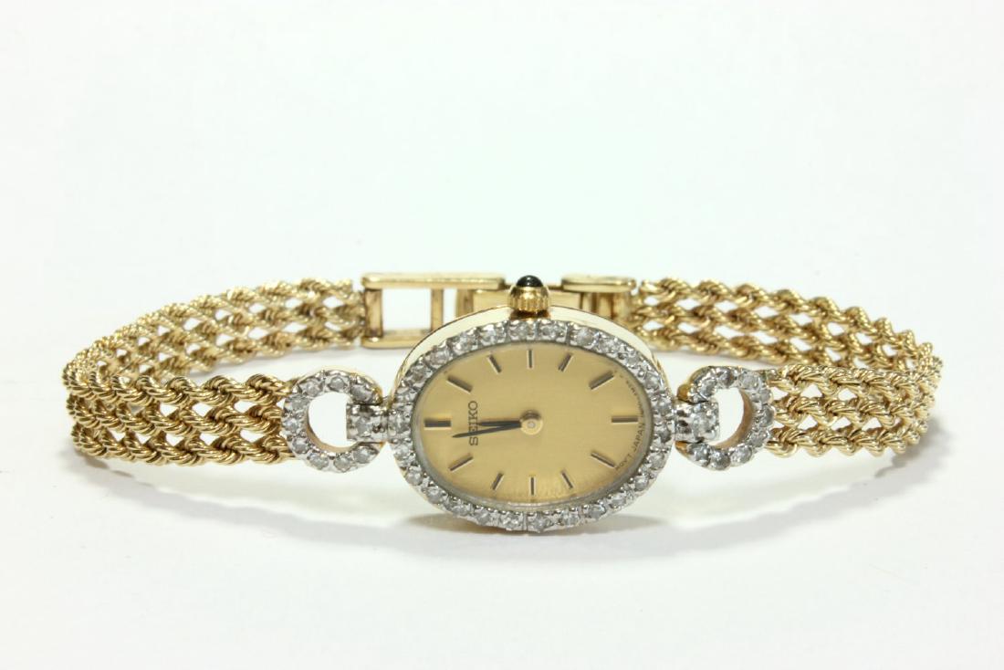 14K Gold Ladies Seiko with Diamond Bezel: Approx. 6 1/2" L. Approx. 8.9 dwt with works. (7109)