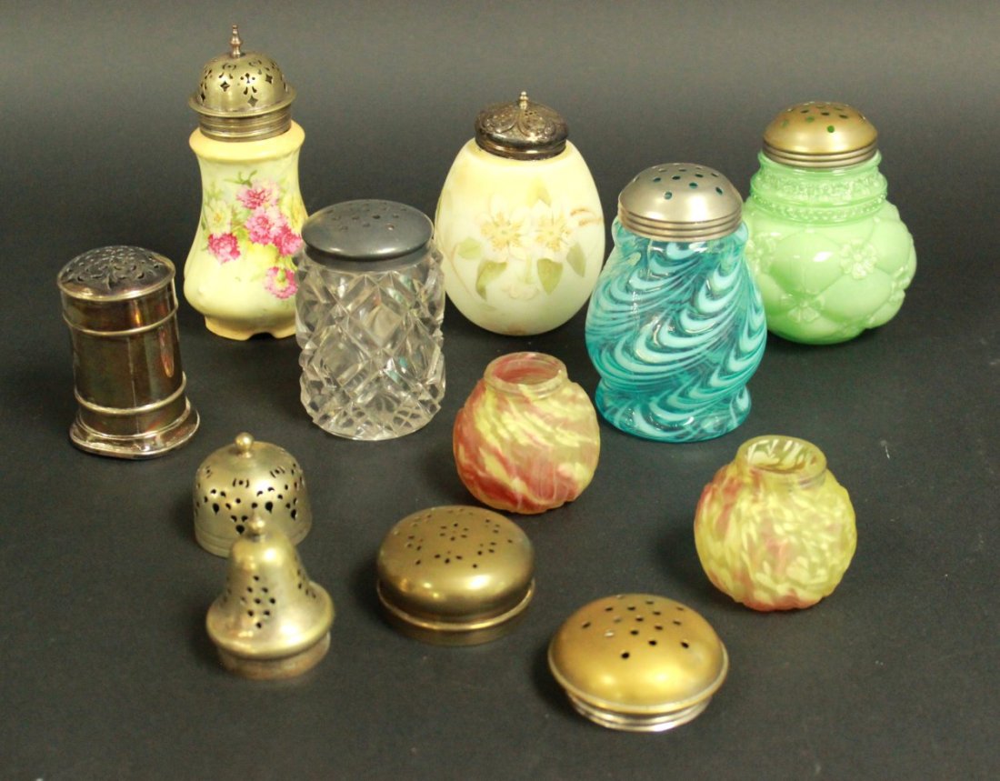 8 Victorian Sugar Shakers with 2 Lids: From the personal collection of Jeffrey Zimmerman. Tops don't match on 2. Silverplated one is dented on bottom. 6"H