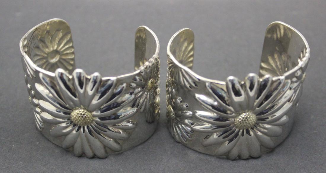 Pair 925 Sterling Silver Daisy Cuff Bracelets: Approx. 6.125 ozt; 190.5 grams.