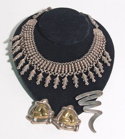 Group lot assorted jewelry: Including 925 Silver necklace with fish design, 925 silver pin & pair silver two tone earrings.