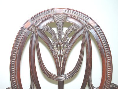 2 complimentary hand carved mahogany arm chairs - 2