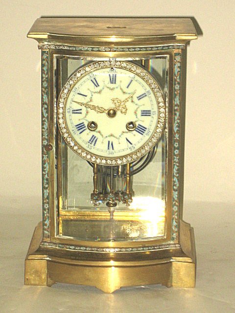 Enamel & crystal regulator clock: With key & pendulum. Approx. 10" H