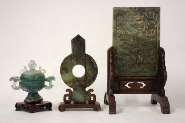 Group lot assorted Oriental smalls: Includes: 1-9.5" x 6.5" carved jade plaque with dragon motif, 1-9.25" H carved jade disk on stand, 1-5.5" x 6" carved quartz covered small urn on stand (repaired)