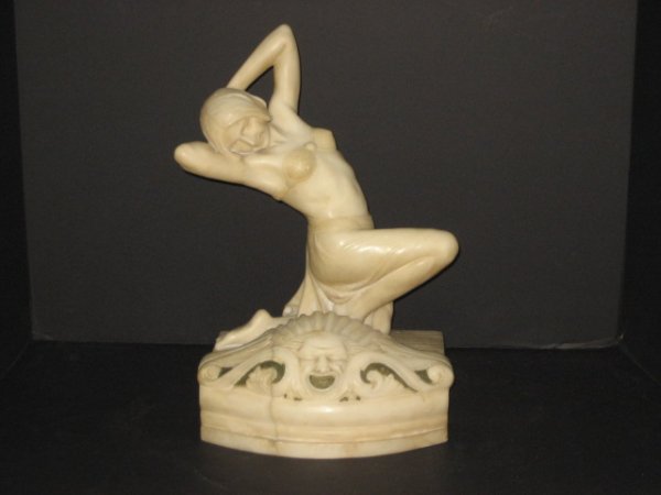 Alabaster Deco figural lamp: Depicting "Kneeling Girl". Some cracks in alabaster. Figure is in good condition, base has crack & flakes. Approx. 14" H x 8.75" W x 8" D.