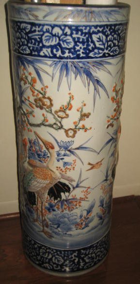 Chinese porcelain umbrella stand: Approx. 23.5" H. From the Palmetto Estate of Dorothy Martin.