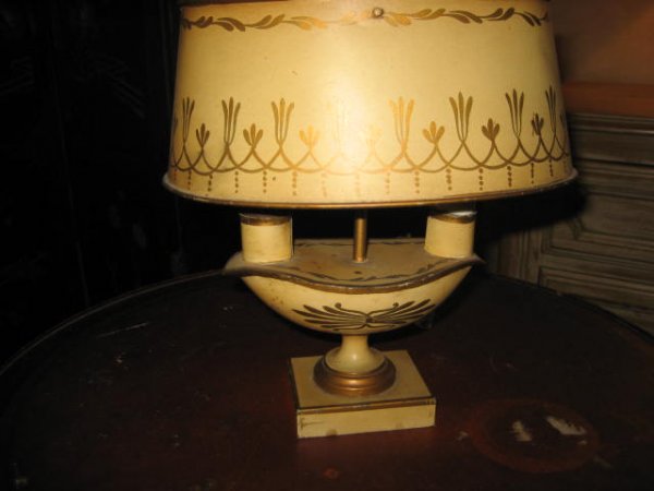 Tole, cream & gold lamp: Electrified. Made in France. Approx. 15.5" H. From the Palmetto Estate of Dorothy Martin.